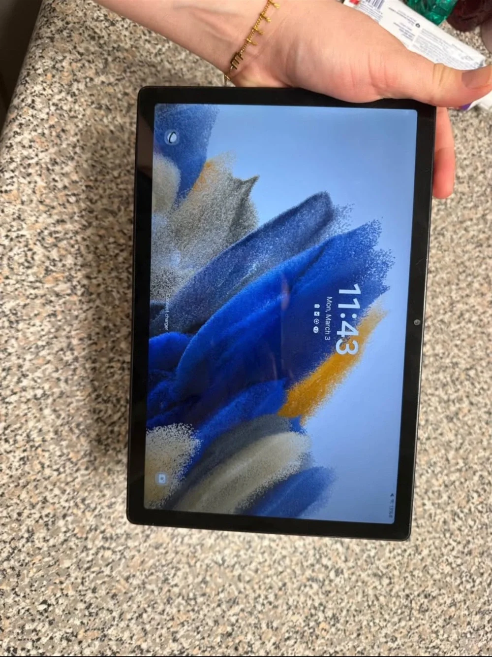 Samsung Tablet with Black Bezel and Blue Accent Display